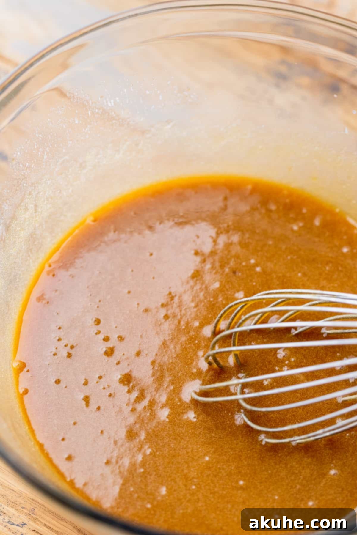 Decadent Chocolate Cherry Cookies 5 Wet ingredients (melted butter, sugars, vanilla, eggs) in a mixing bowl.