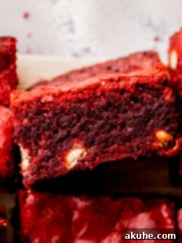 Red velvet brownies with one on its side.