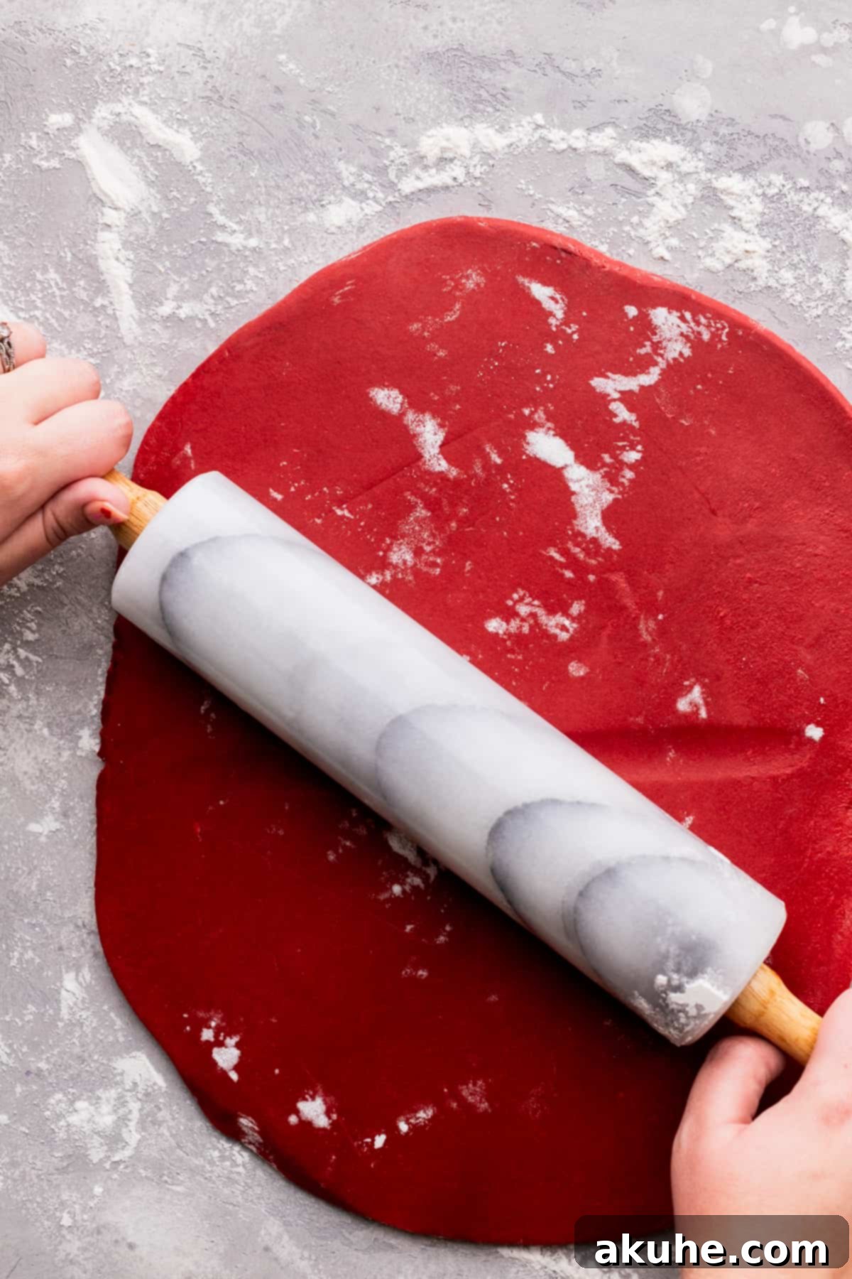 Decadent Red Velvet Cinnamon Rolls 7 Rolling out the dough.