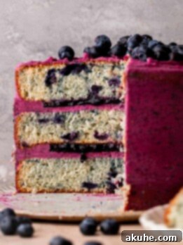 Bursting Berry Bliss 15 Blueberry cake on a platter opened up.