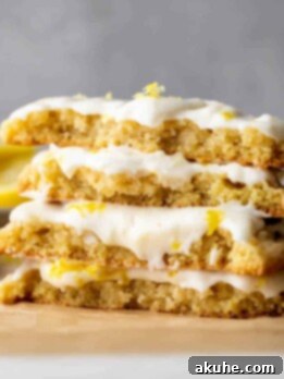 Zesty Lemon Bites 11 Stack of 2 lemon cookies split in half.