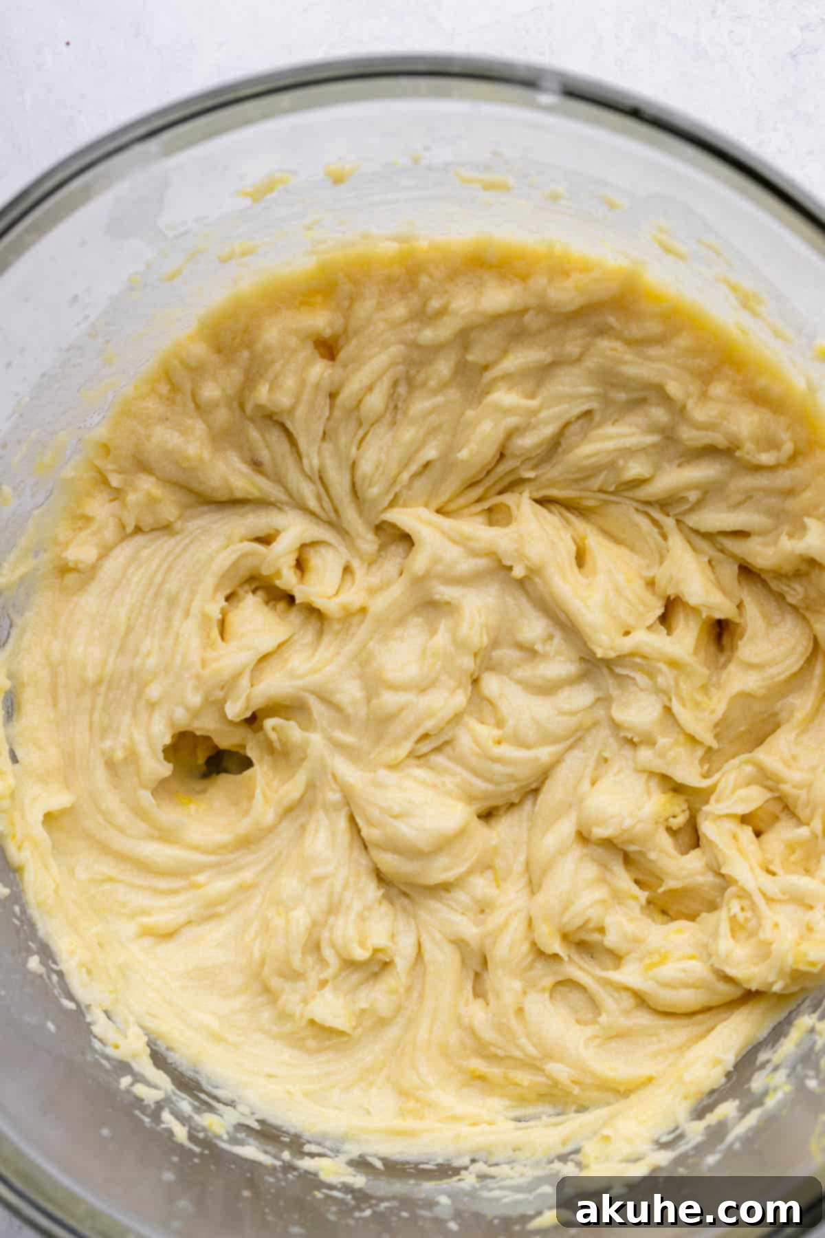 Zesty Lemon Bites 4 Wet ingredients added to the butter and sugar mixture.