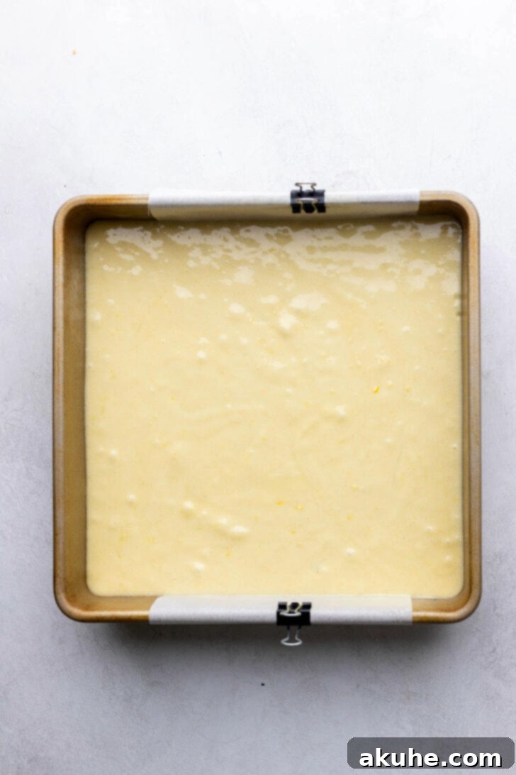 Zesty Lemon Brownies 6 Unbaked brownie batter spread evenly in a prepared baking pan.