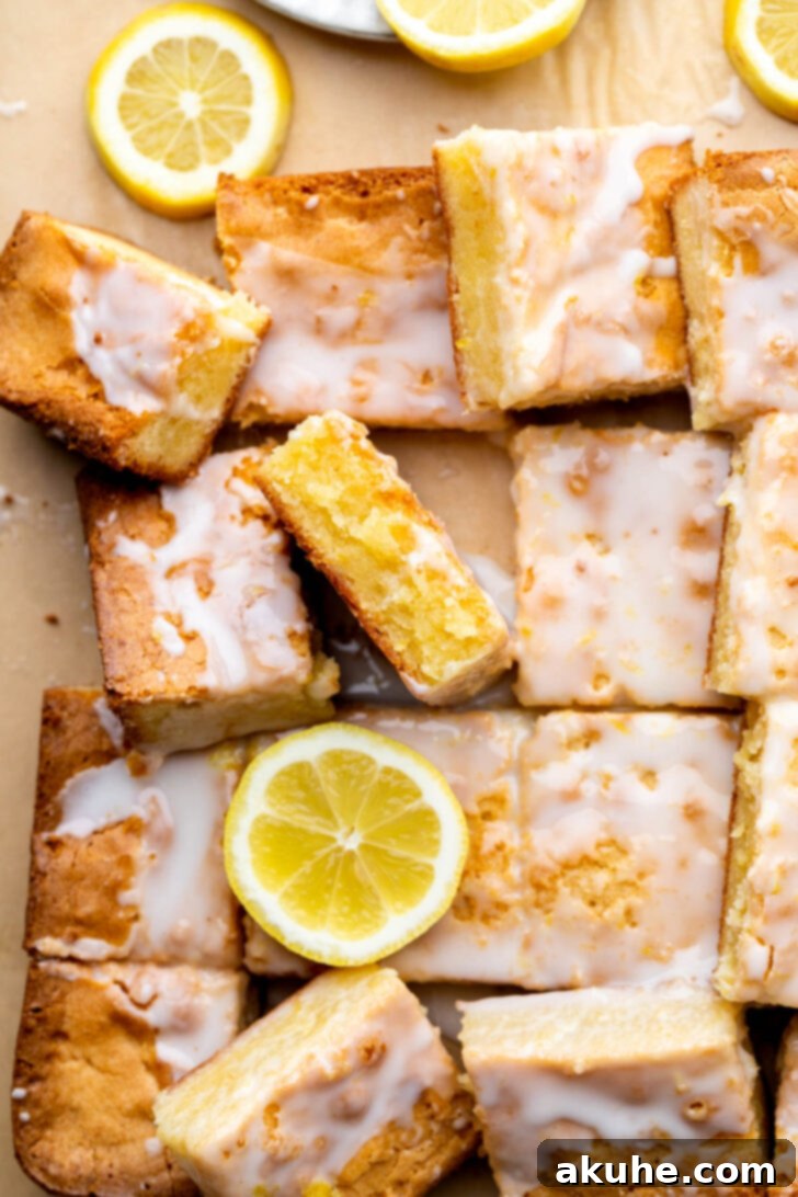 Zesty Lemon Brownies 8 Top view of an entire batch of lemon brownies, cut into squares and perfectly glazed.