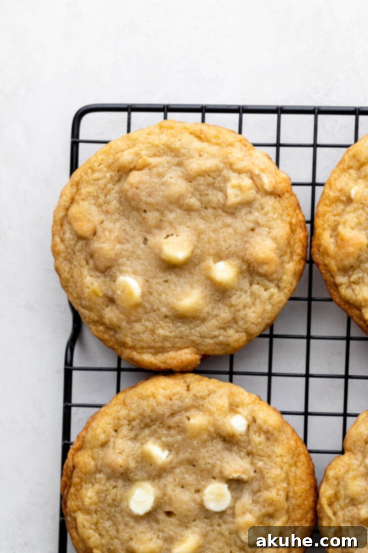 The Ultimate Banana Pudding Cookies 7 A freshly baked banana pudding cookie cooling on a wire rack.