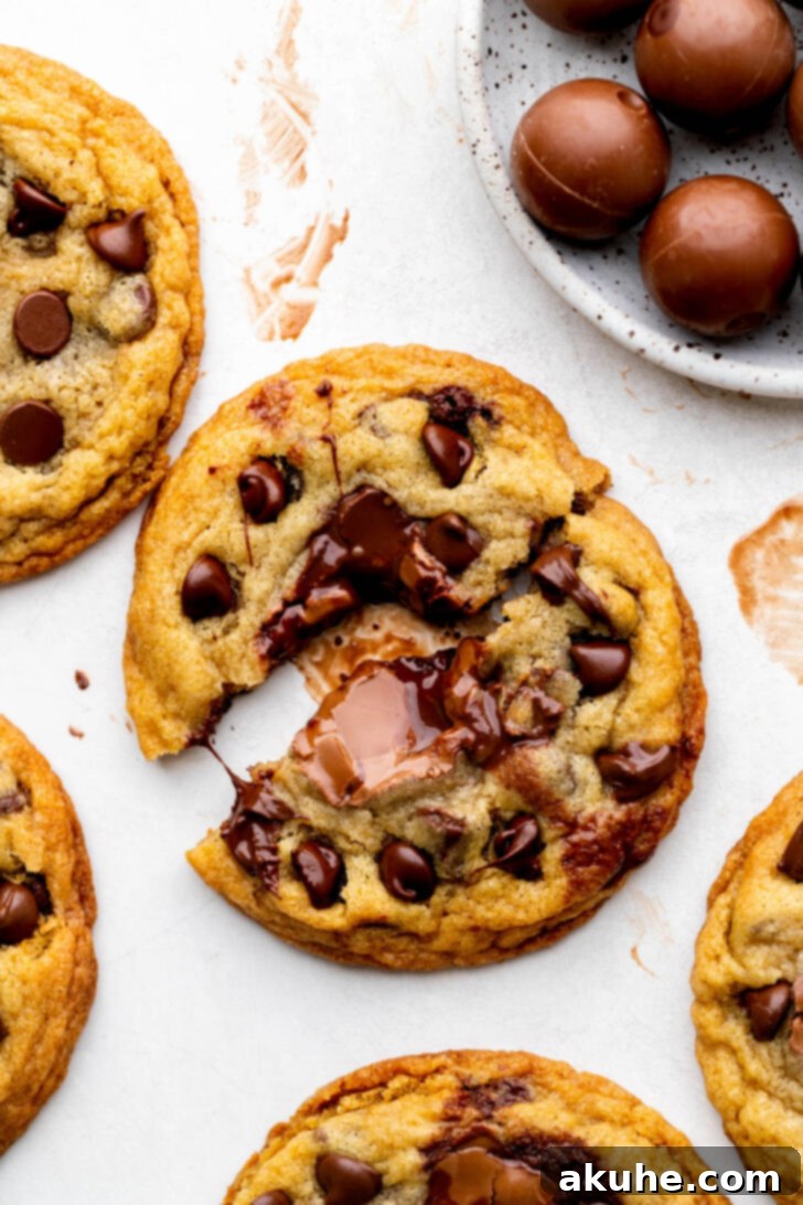 One lindt stuffed cookie split in half.