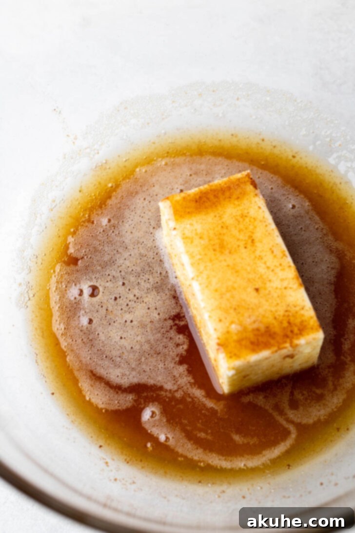Butter and brown butter in a bowl.