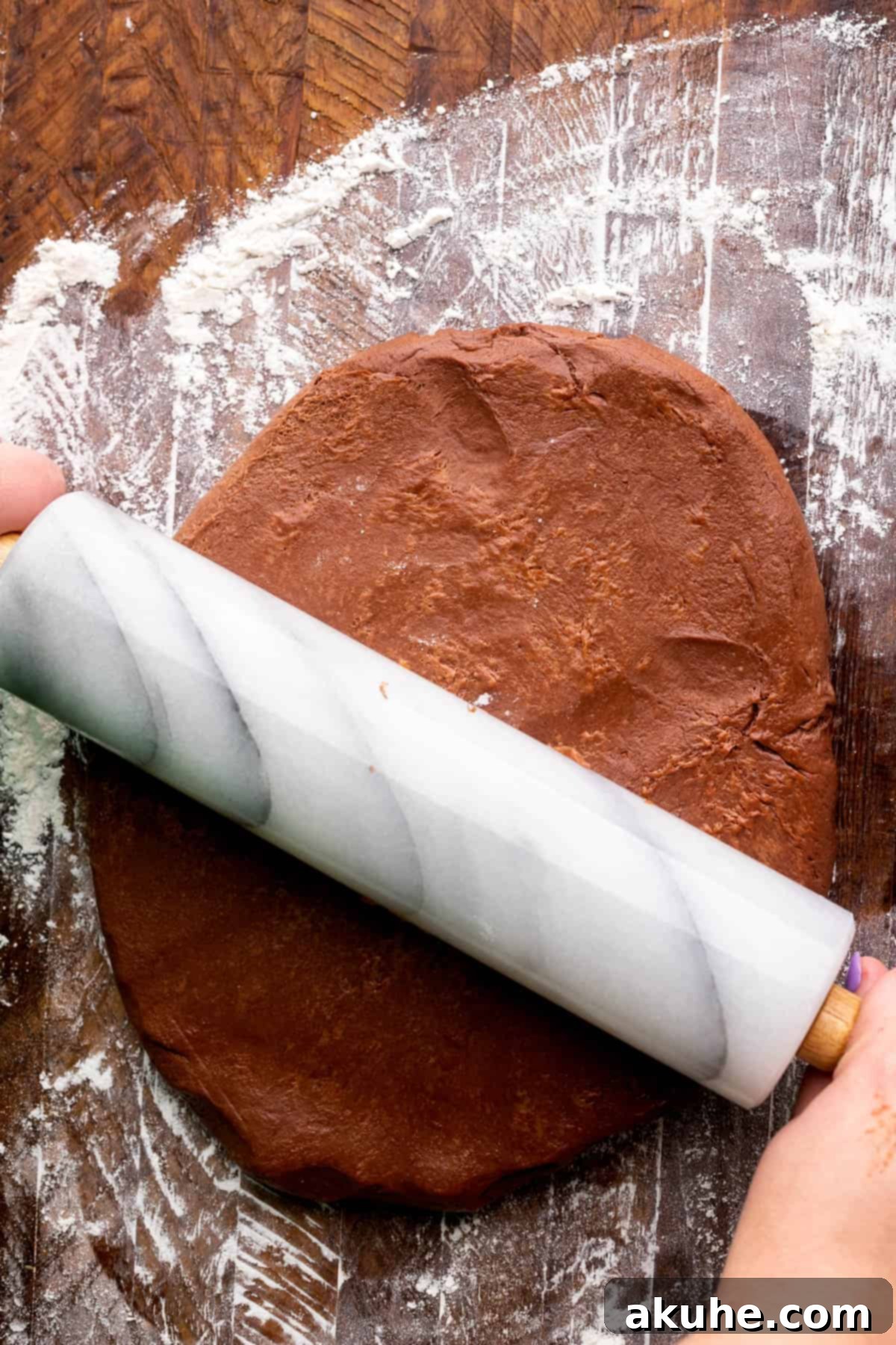 Decadent Chocolate Rolls 6 Rolling out the chocolate dough on a lightly floured surface.