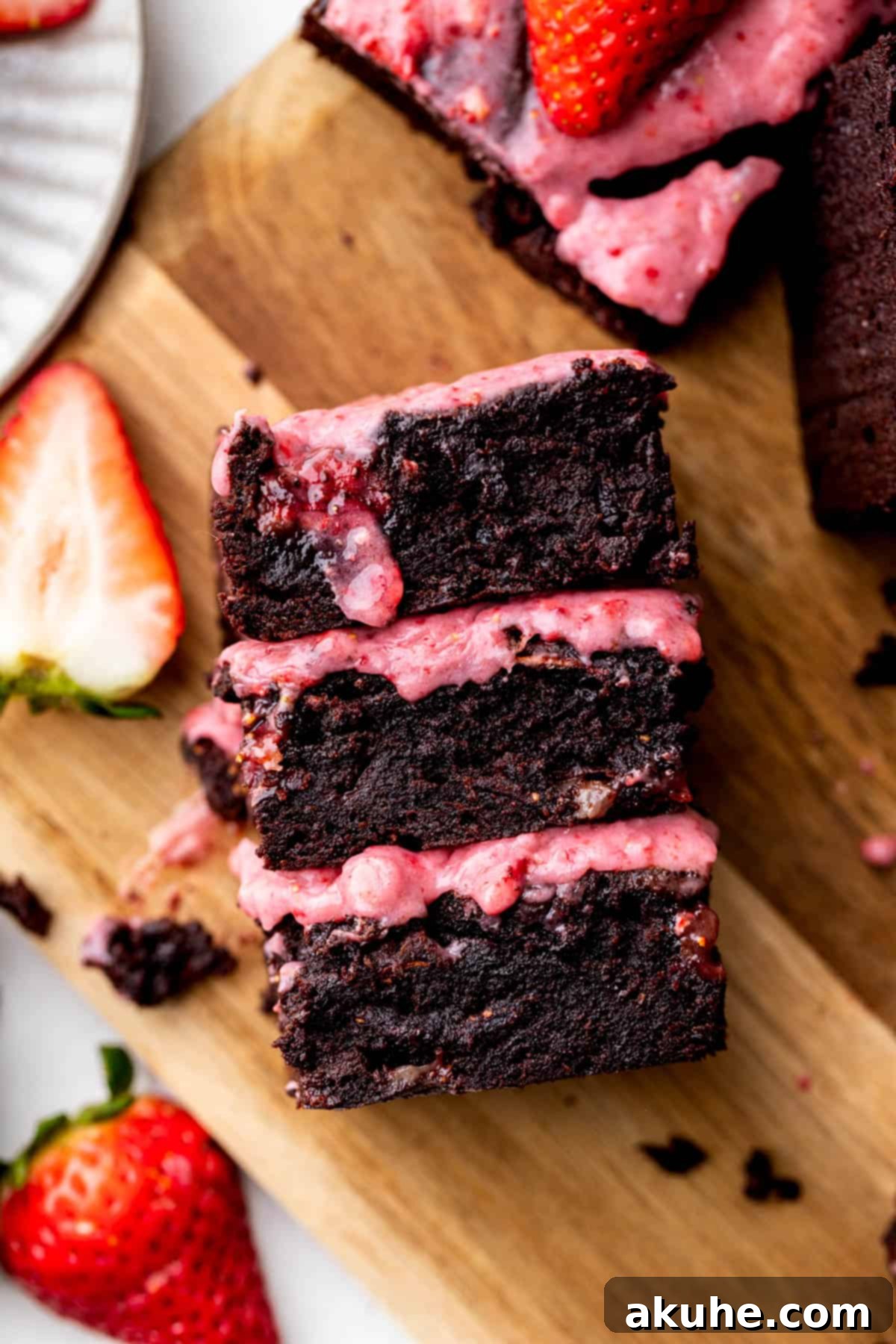 Decadent Strawberry Brownies 12 Three brownies on its side.