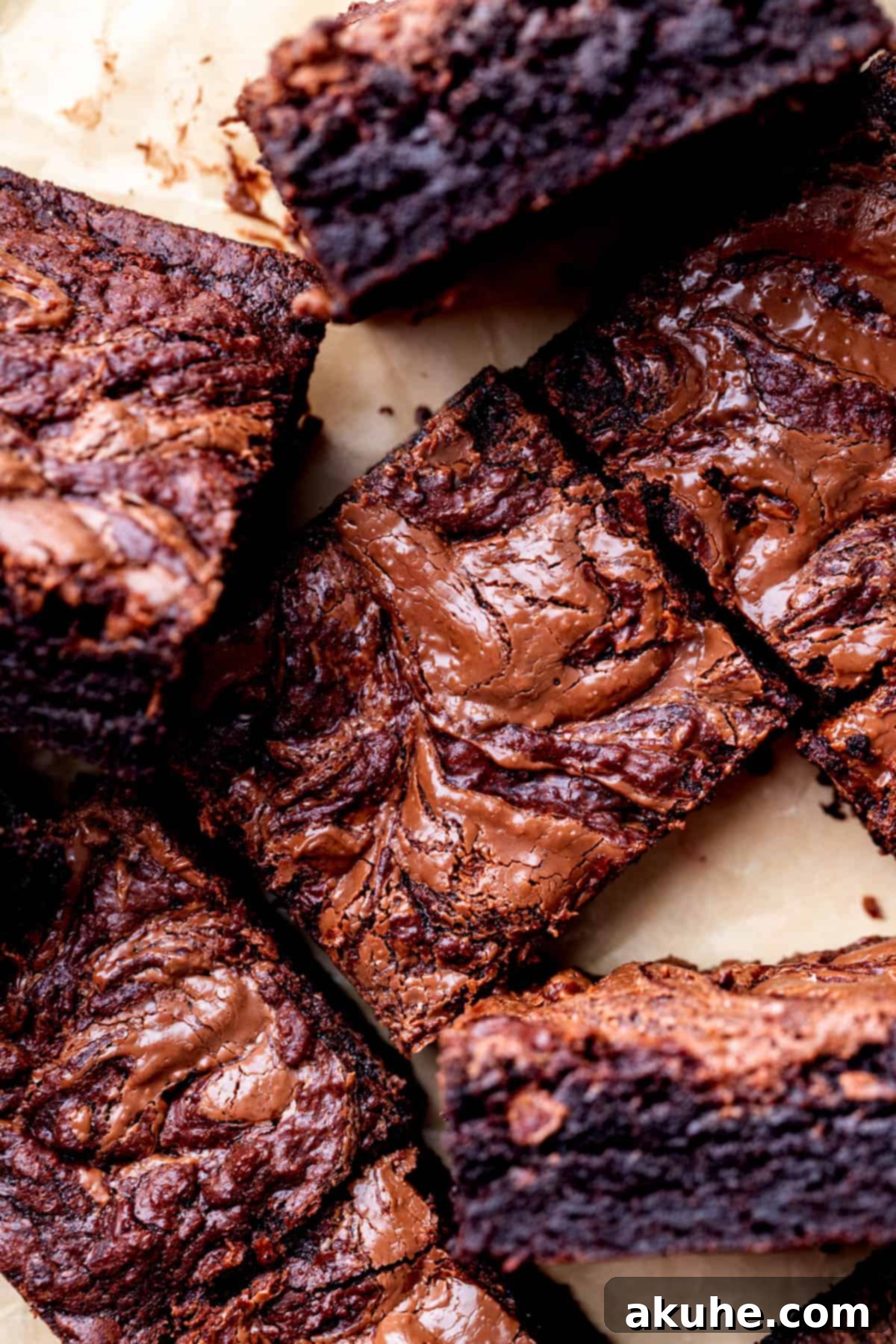 Decadent Nutella Brownies 2 Close up of Nutella brownies, showcasing their fudgy texture and swirl.