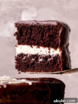 Creamy Chocolate Fudge Cake 13 Taking a slice out of the ding dong cake.