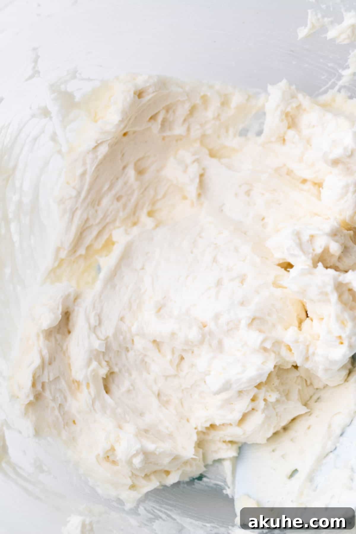 Creamy Chocolate Fudge Cake 8 Cream filling in a glass bowl.