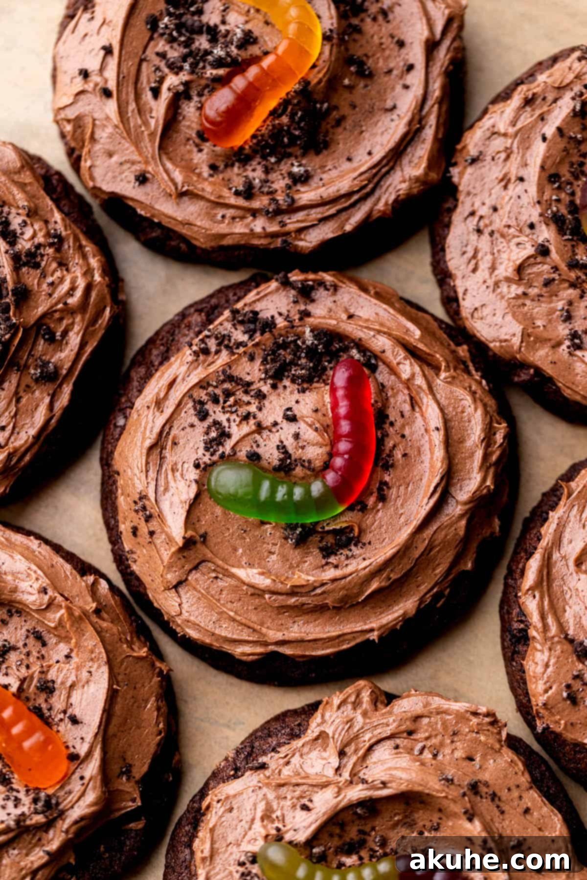 Dirt cake cookies on parchment paper, ready to be enjoyed.