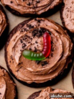 Dirt cake cookies on parchment paper.