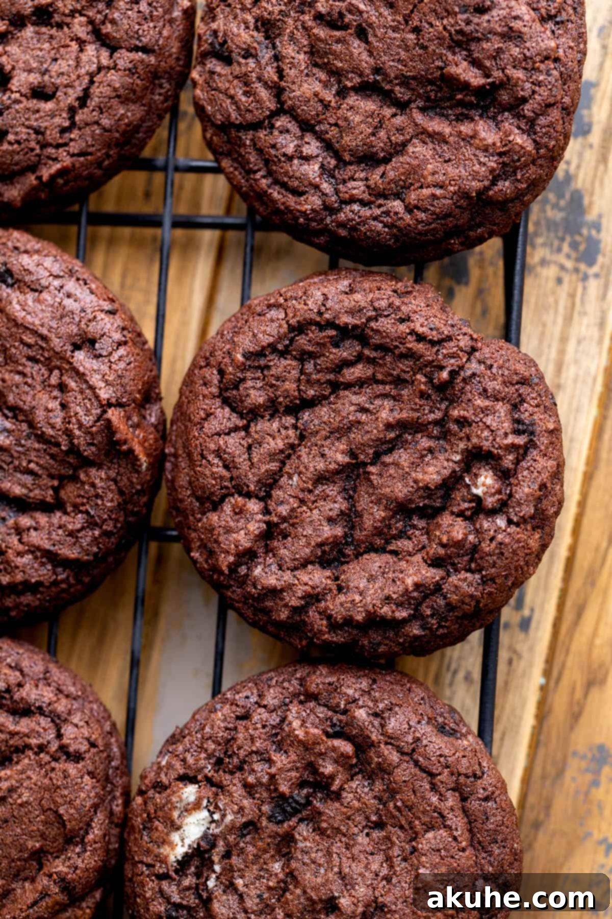 Baked cookies cooling on a wire rack.