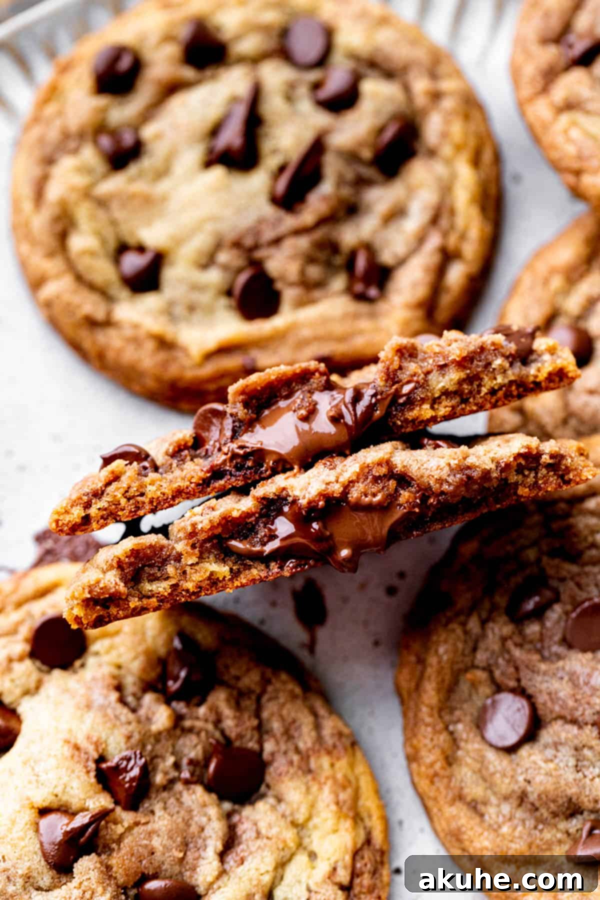 Swirled Nutella Delights 11 One Nutella cookie split in half, revealing a perfectly melted and gooey Nutella filling.