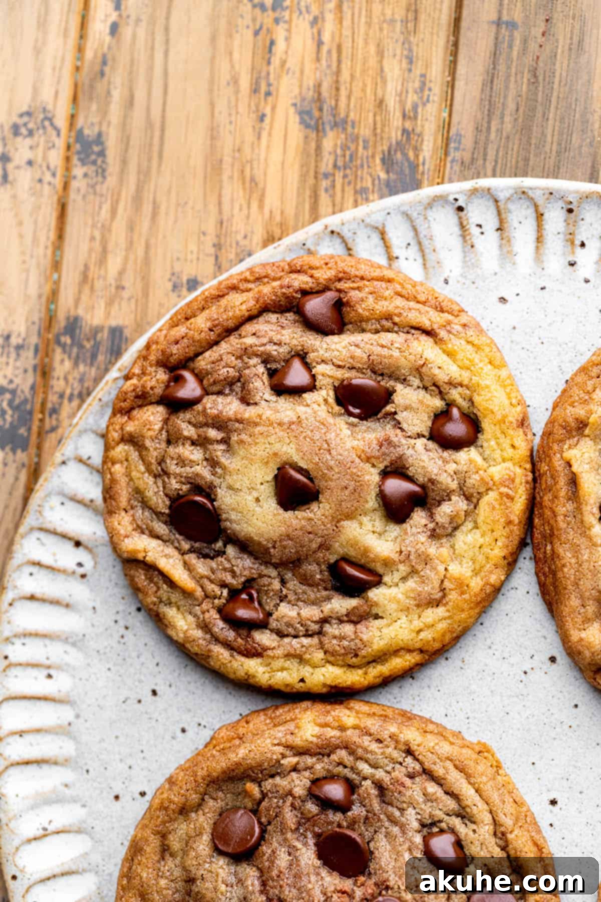 Swirled Nutella Delights 3 Baked Nutella cookie on a platter, showcasing its golden-brown edges and soft center.