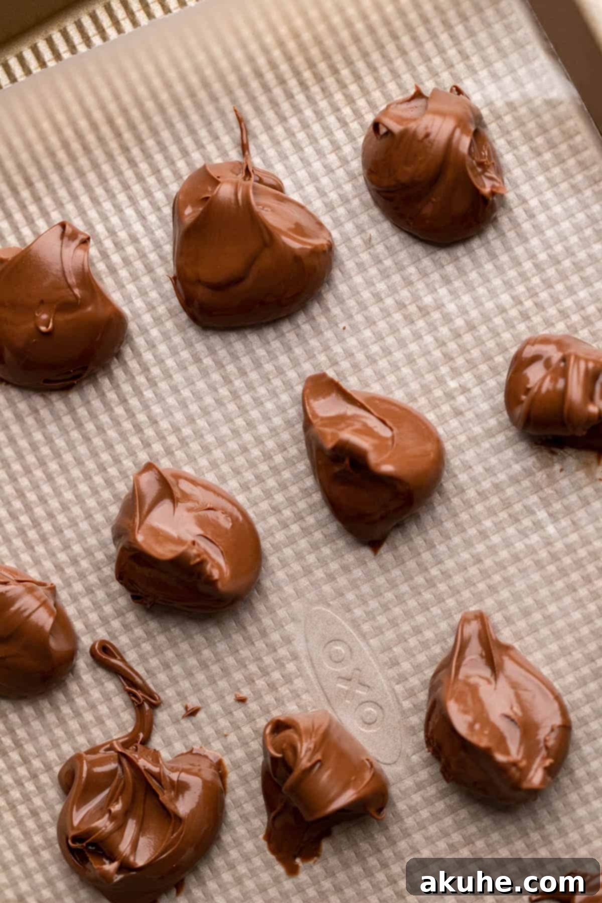 Swirled Nutella Delights 4 Nutella dollops scooped onto wax paper and ready for freezing.