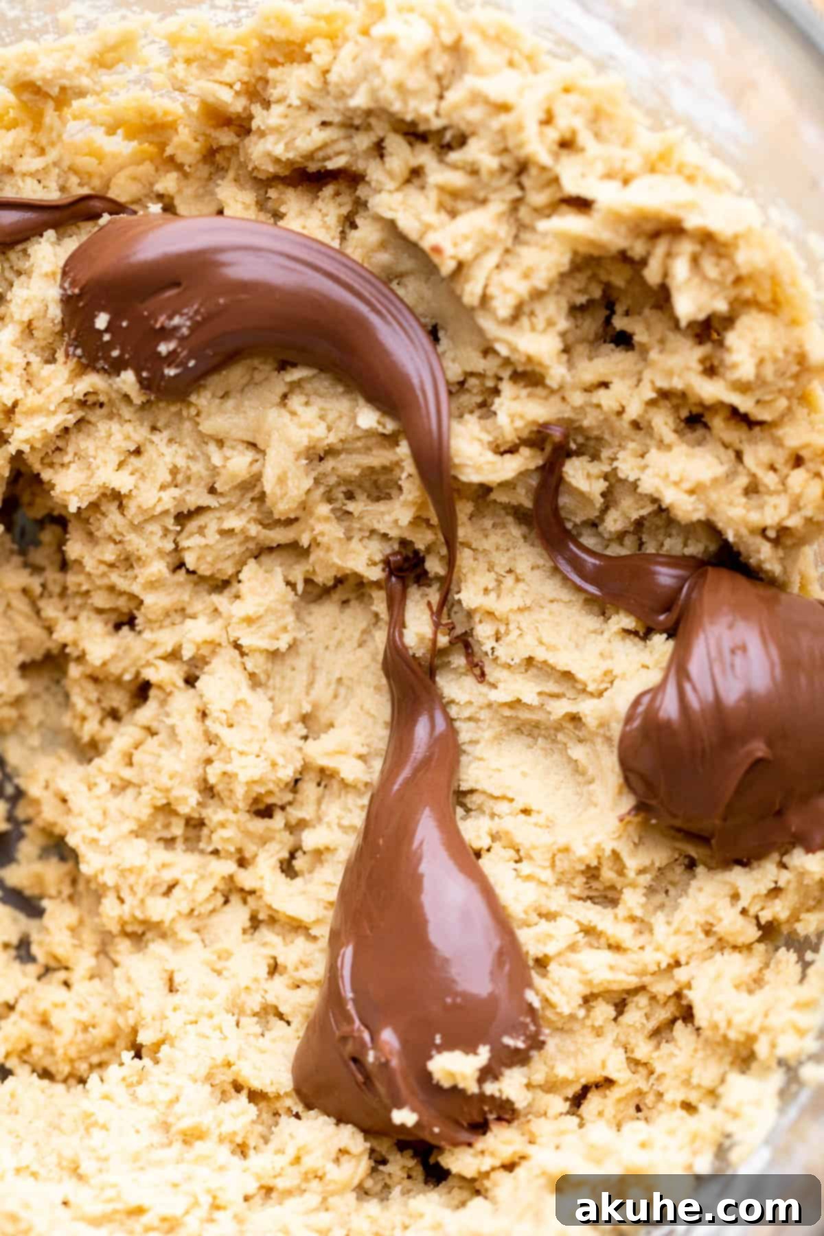 Swirled Nutella Delights 6 Drops of Nutella swirled into chocolate chip cookie dough.