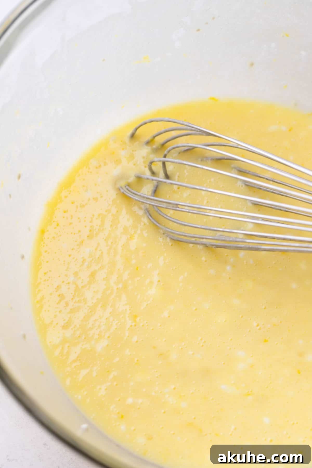 Zesty Lemon Donuts 4 Wet ingredients in a bowl, ready to be mixed with dry ingredients.