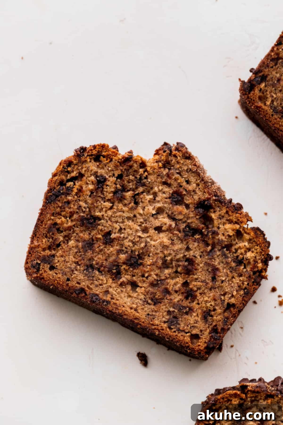 Cinnamon Swirl Chocolate Chip Banana Bread 9 A single, delectable slice of Cinnamon Chocolate Chip Banana Bread.