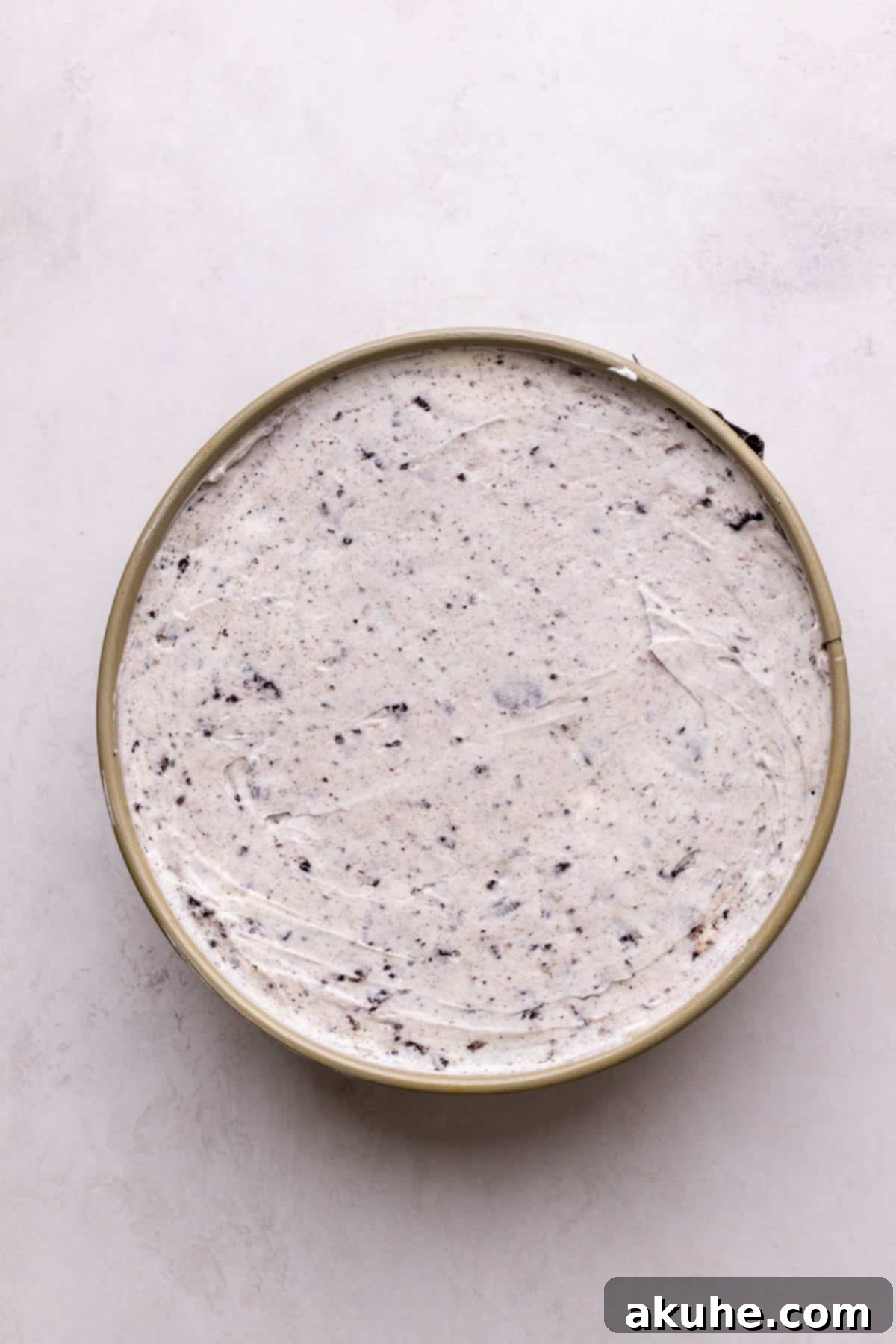 Oreo no bake batter in a springform pan.