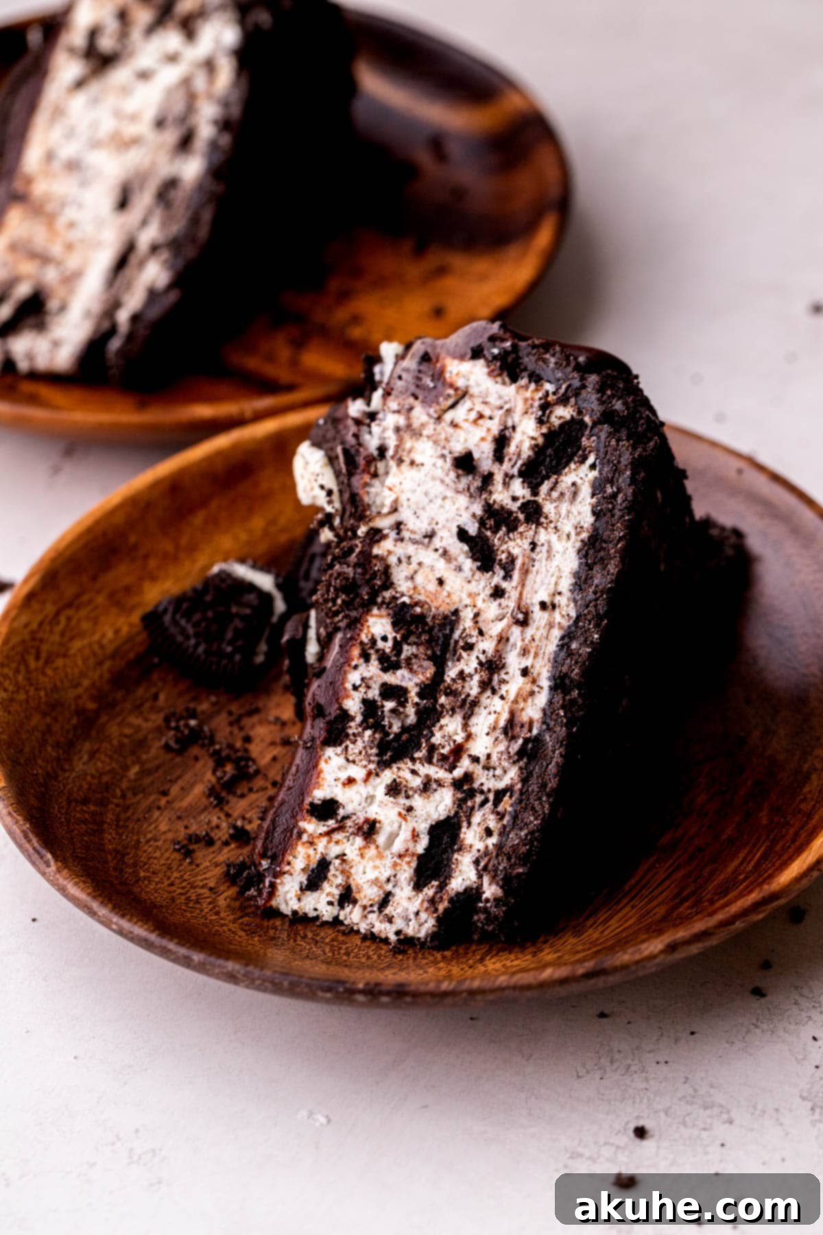 One slice of no bake oreo cheesecake on a plate.