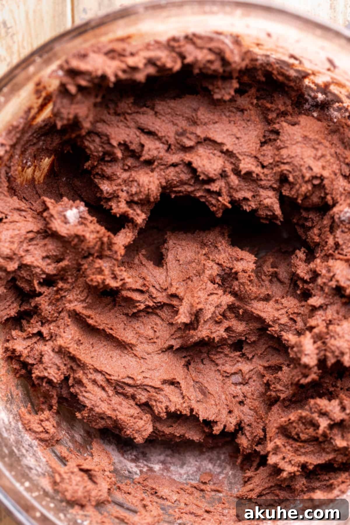 Fudgy Chocolate Delights 6 Rich chocolate cookie dough in a glass bowl, perfectly mixed and ready for chilling.