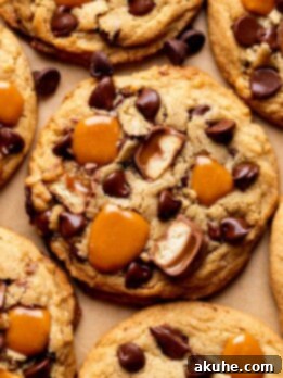 Twix cookies on parchment paper.
