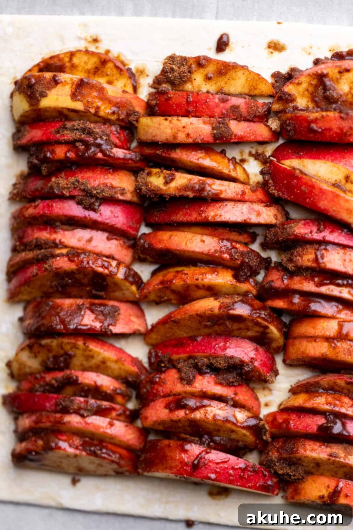 Golden Apple Puff Tart 7 Neatly arranged apple slices layered onto the scored puff pastry, forming the base of the tart.