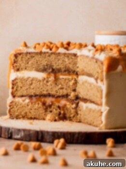 Rich Butterscotch Bliss 15 Butterscotch cake cut open on a wood board.