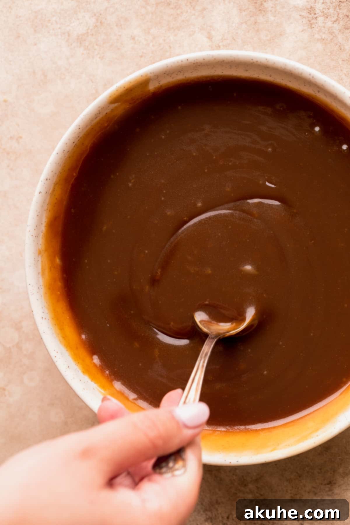 Rich Butterscotch Bliss 4 Butterscotch sauce in a bowl, cooling.