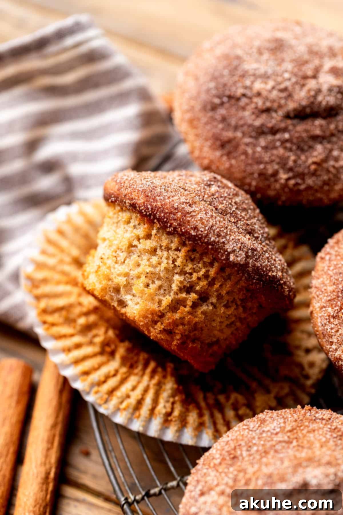 Side view of apple cider muffins.