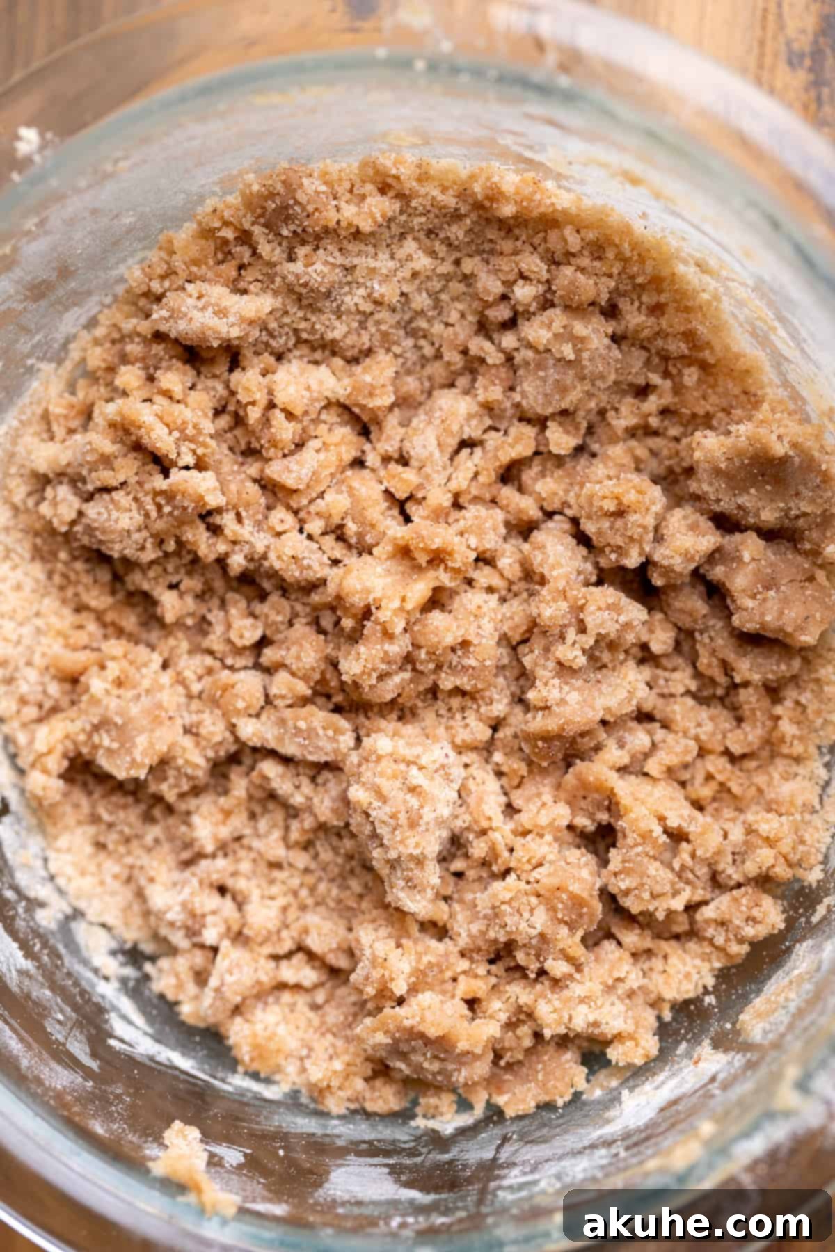 Spiced Apple Cider Cheesecake 5 Cinnamon filling in a glass bowl.