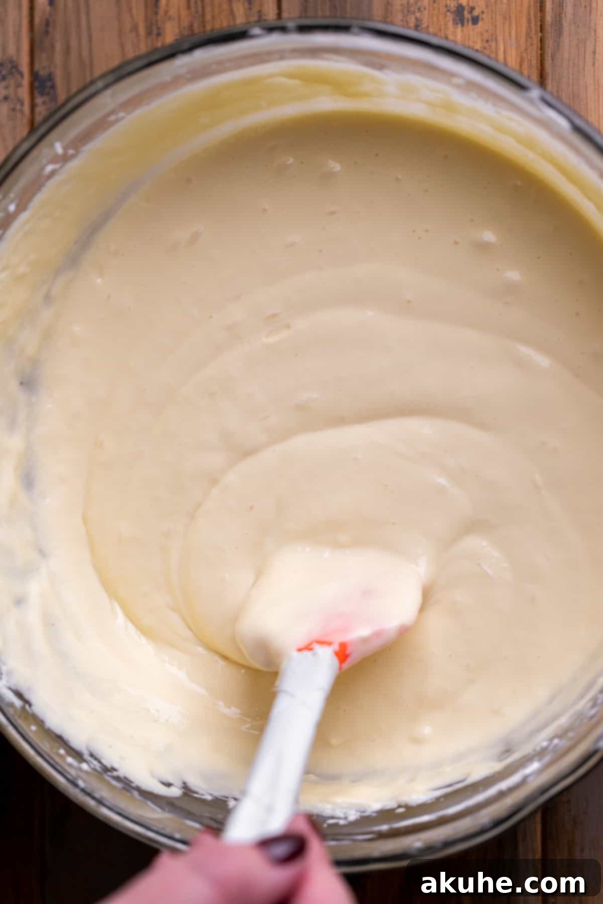 Spiced Apple Cider Cheesecake 6 Cheesecake batter in a glass bowl.