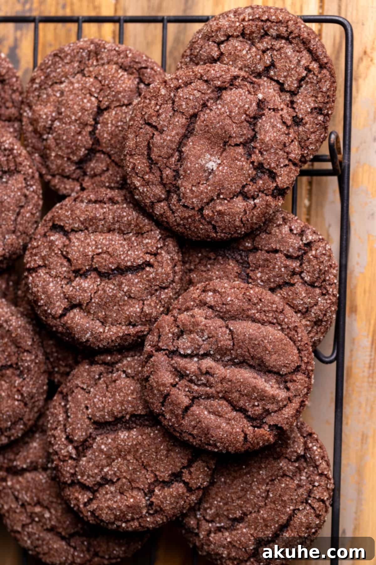 Whimsical Christmas Tree Cookies 8 Baked chocolate cookies on a wire rack.