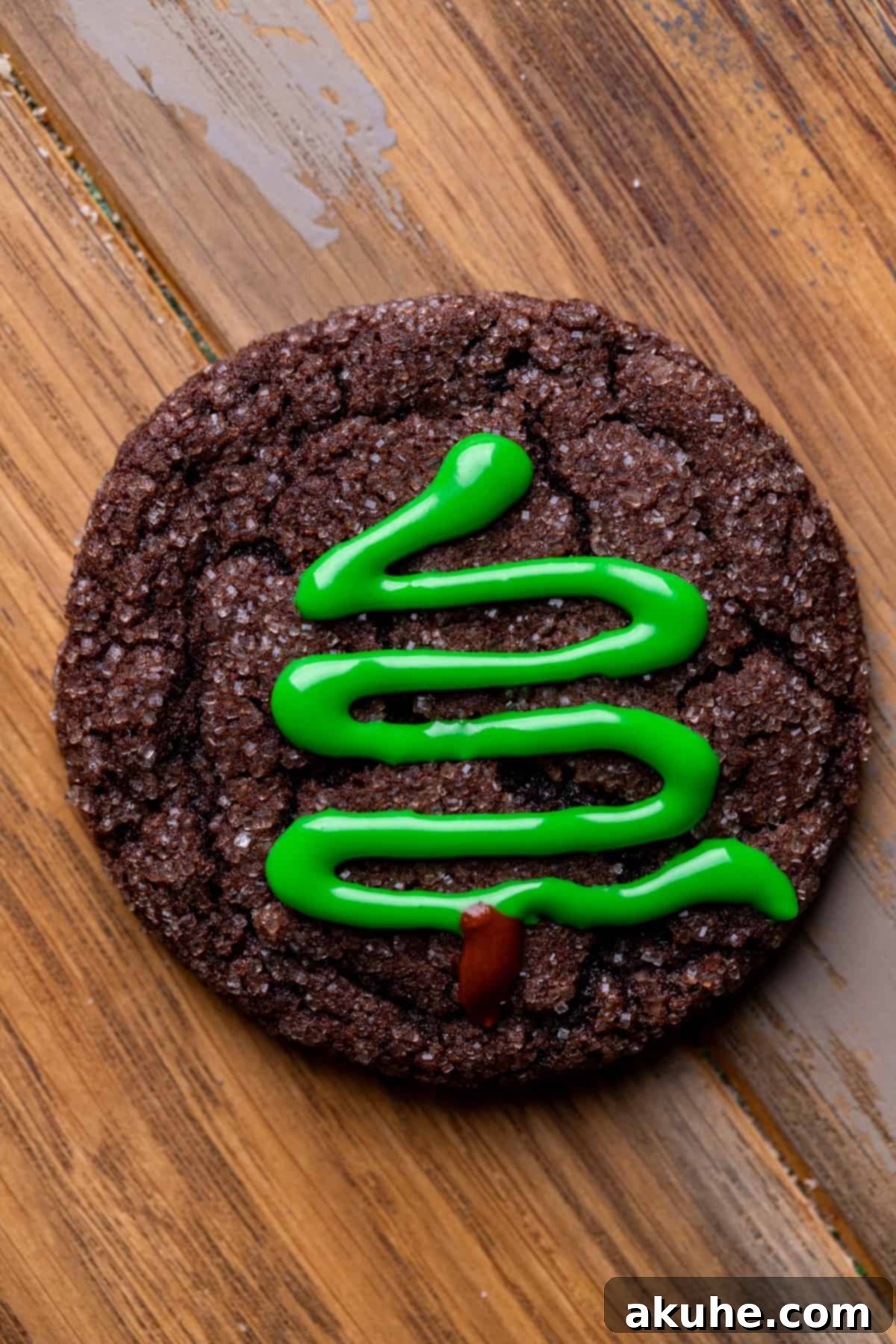 Whimsical Christmas Tree Cookies 9 Chocolate cookie with the green icing on it.