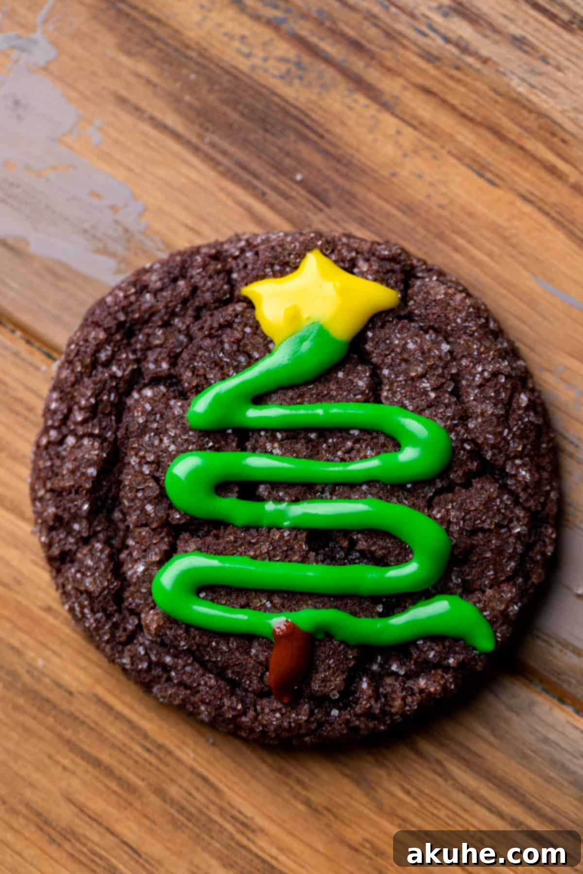 Whimsical Christmas Tree Cookies 10 Chocolate cookie with a star on top of the tree with icing.