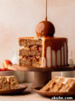Decadent Caramel Apple Delight 13 Split open caramel apple cake on a cake stand.