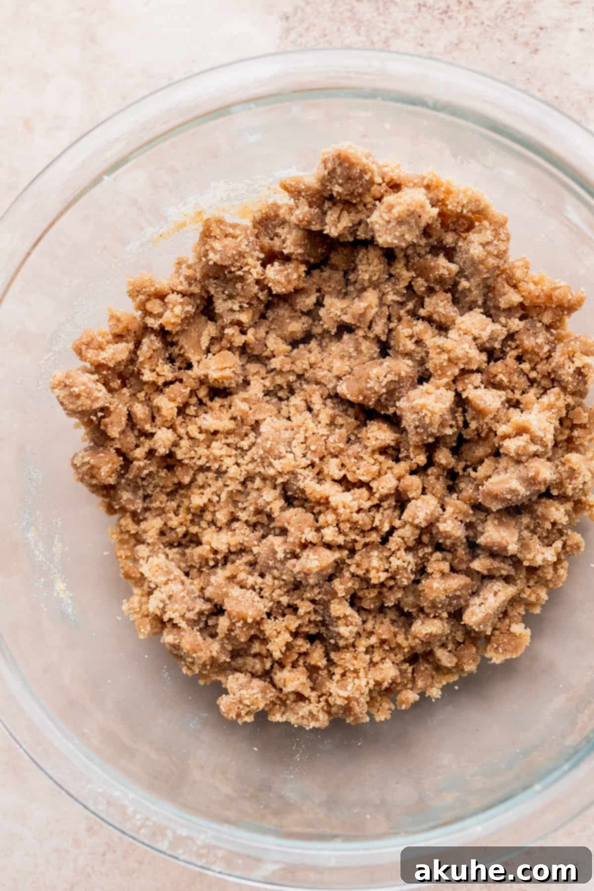 Spiced Pumpkin Loaf with Cream Cheese Frosting 4 Pumpkin spice streusel mixture in a glass bowl, ready to be chilled.