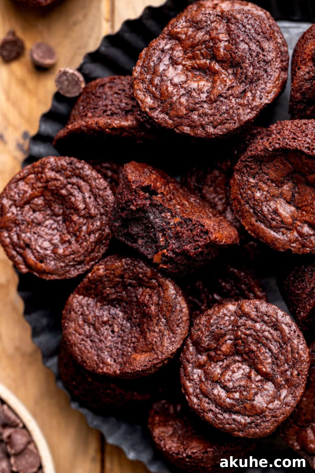 Bite-Sized Brownies 2 Bite missing from brownie bites on a platter.