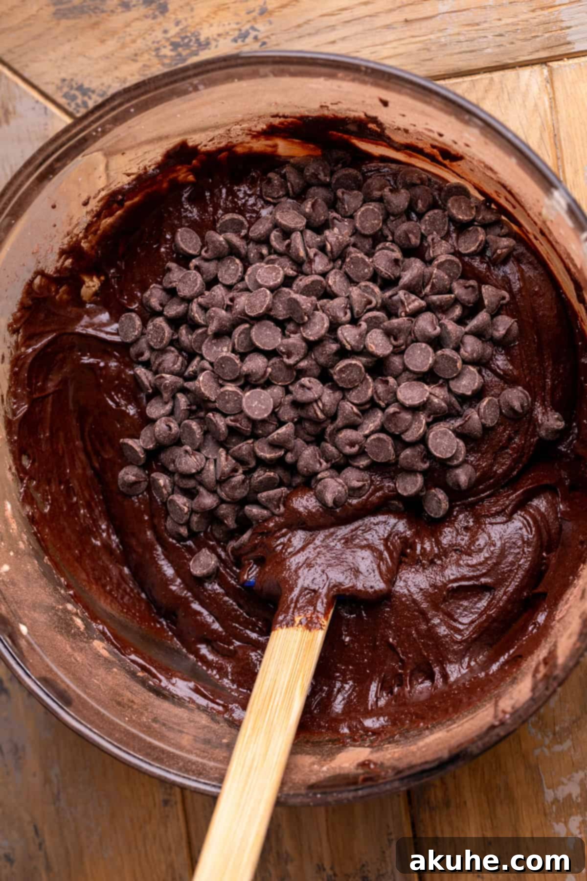 Bite-Sized Brownies 5 Brownie batter in a glass bowl.