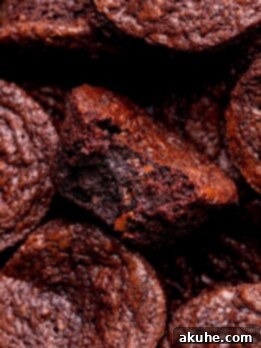 Bite-Sized Brownies 9 Bite missing from brownie bites on a platter.