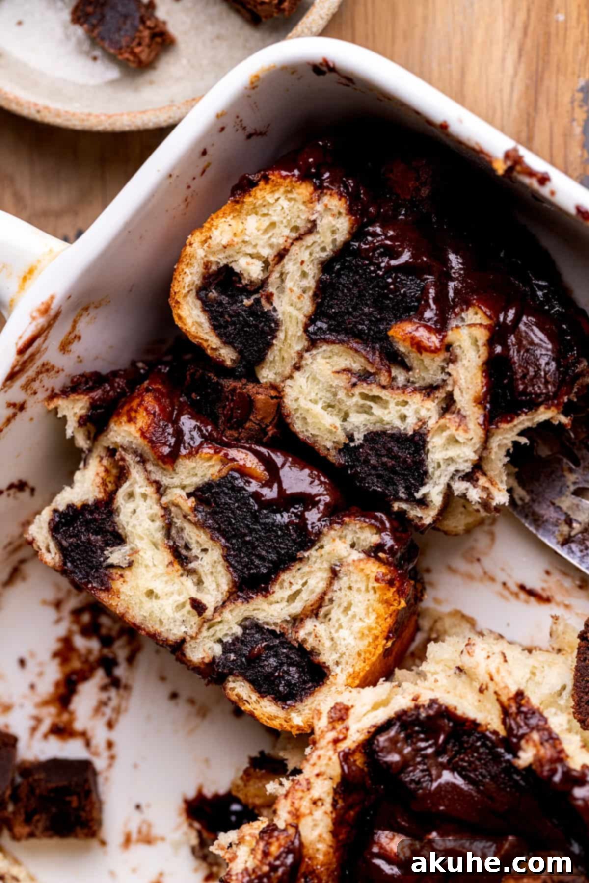 Brownie Swirls 3 A single brownie roll cut in half, revealing its rich chocolate swirl.