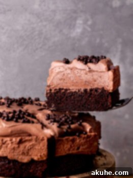 Decadent Chocolate Mousse Dream 14 Taking a slice out of the chocolate mousse cake.