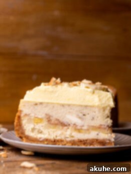 Southern Banana Pudding Cheesecake 13 One slice of banana pudding cheesecake on a plate.