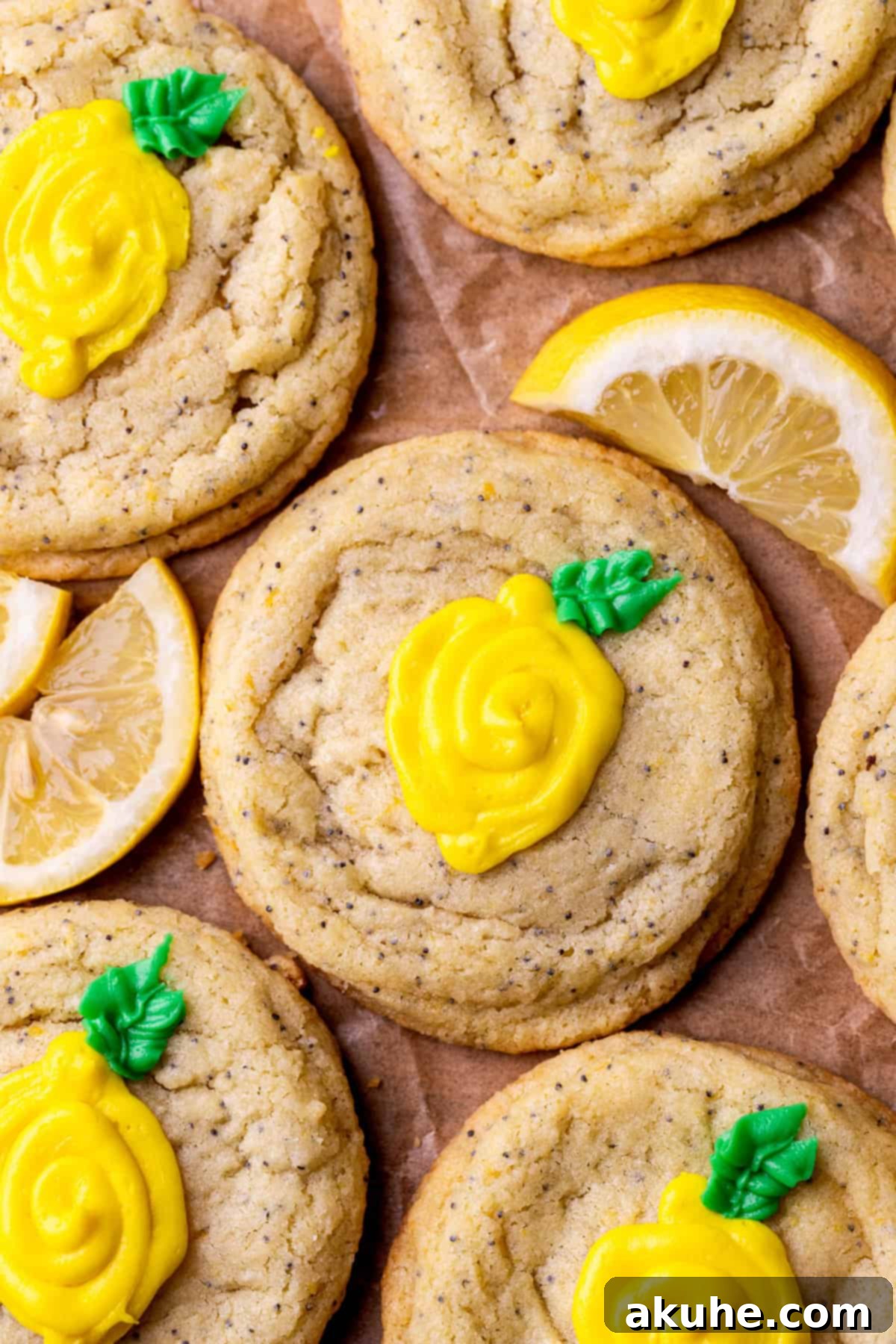 Zesty Lemon Poppy Seed Cookies 10 Top view of multiple lemon poppy seed cookies with frosted lemon decorations.