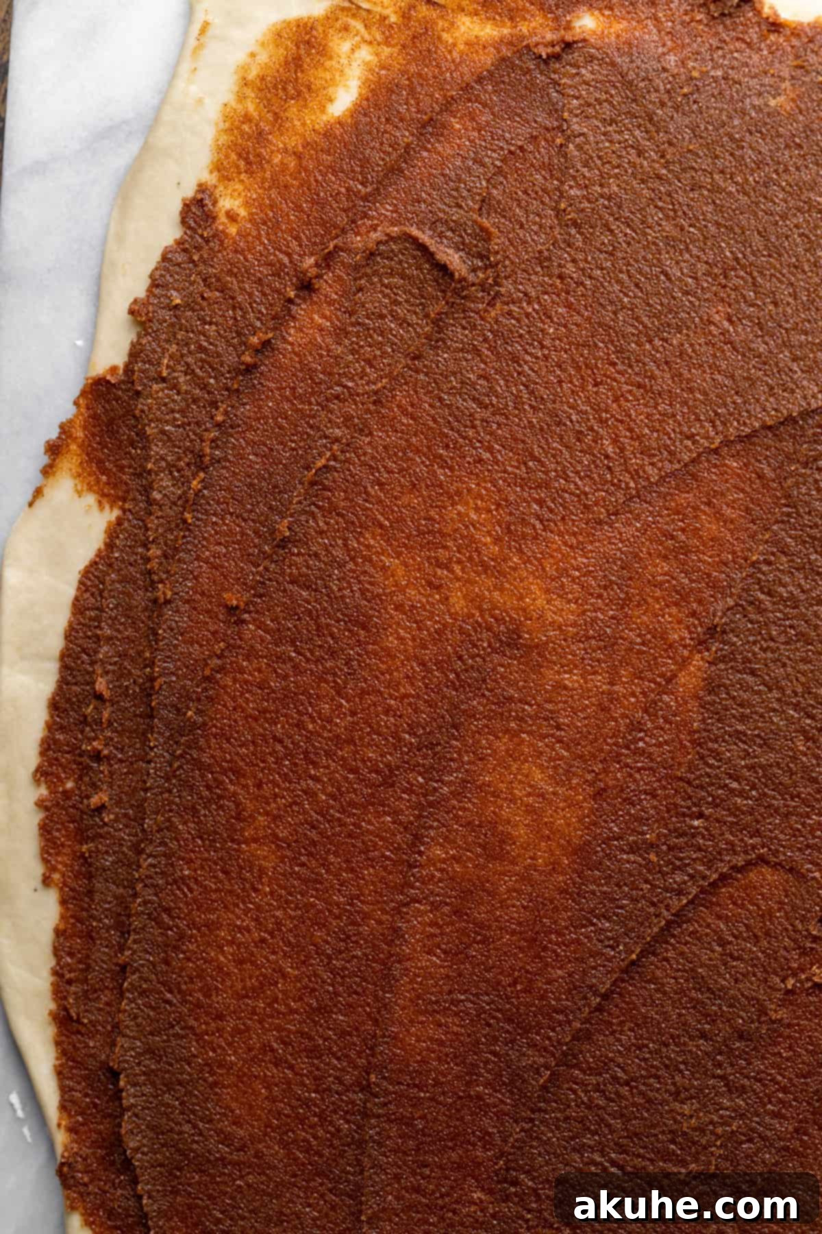 Banana Swirl Buns 4 Creamy cinnamon sugar filling spread evenly across the rectangle of banana dough.