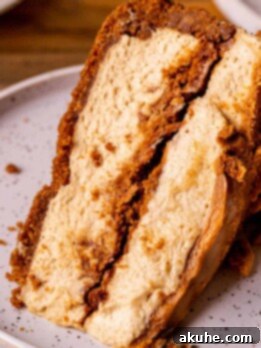 Decadent No-Bake Biscoff Cheesecake 14 Slice of no bake biscoff cheesecake on a plate.