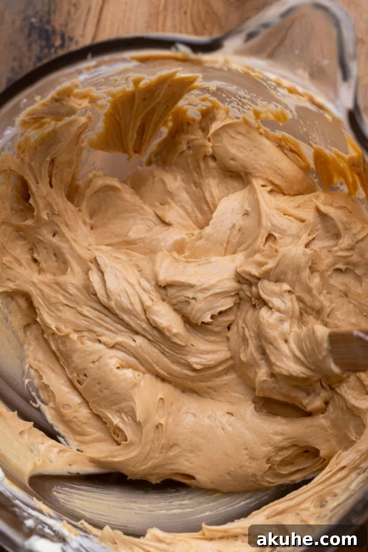 Decadent No-Bake Biscoff Cheesecake 5 Cheesecake mixture in a glass bowl.